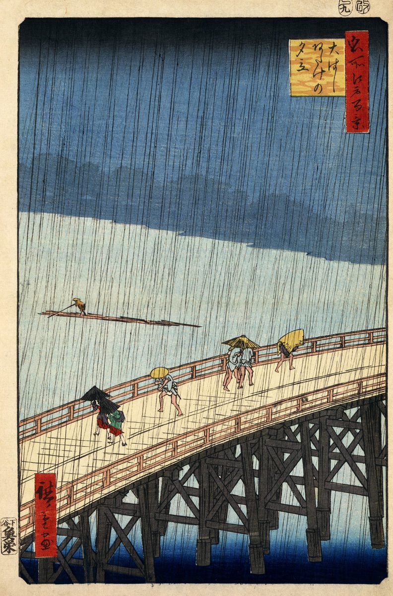 Hiroshige's Sudden Shower over Shin-Ohashi Bridge: figures with umbrellas crossing a wooden bridge in slanting rain, a boatman on the river below